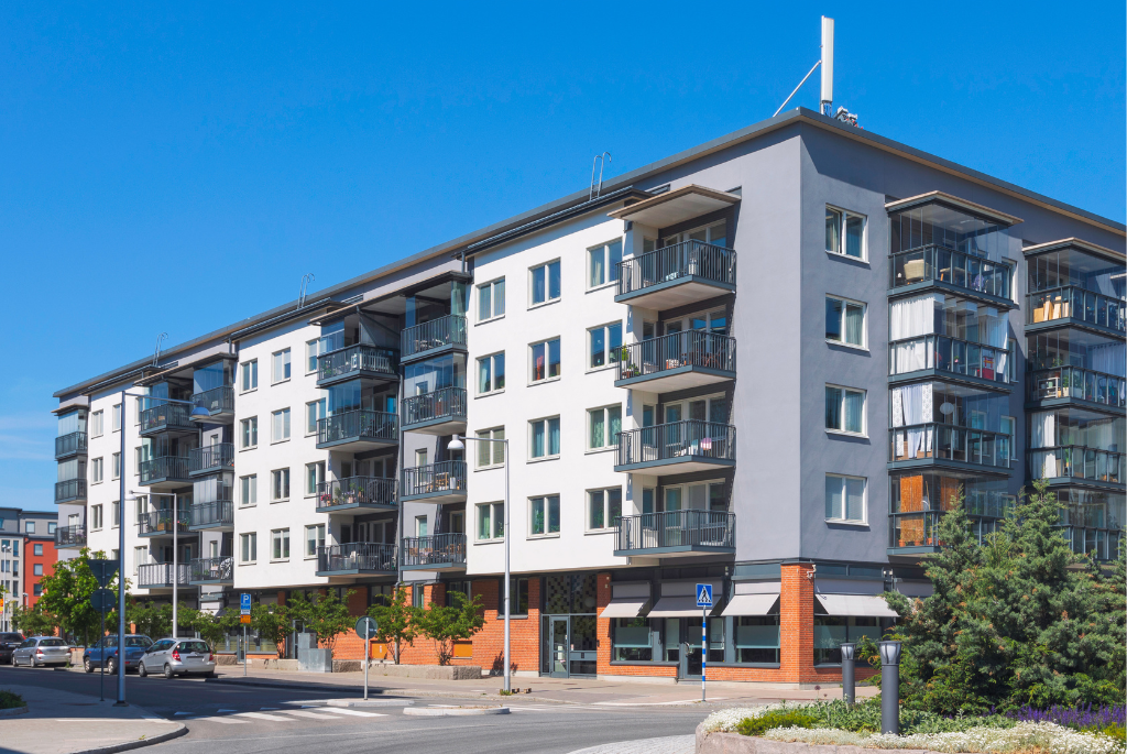 Modern multifamily apartment building exterior with balconies