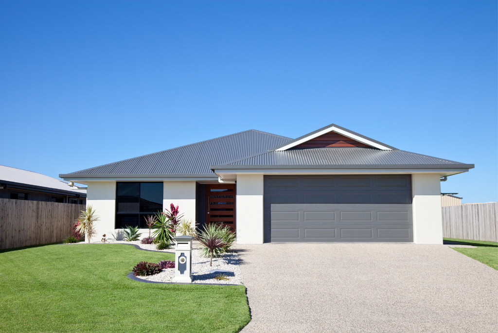 Small single-family home exterior with efficient, compact design
